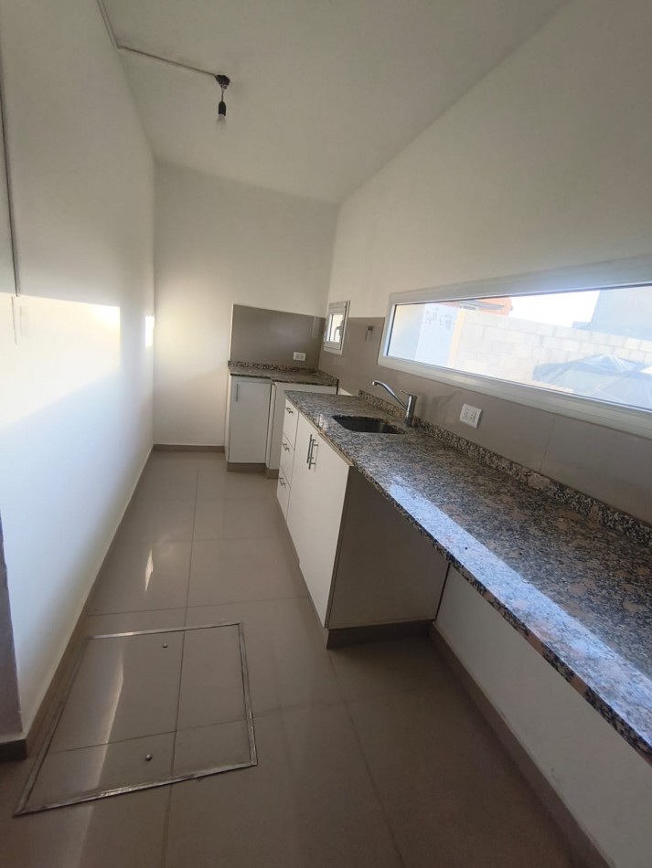 CASA EN PUEYRREDON - TRES DORMITORIOS